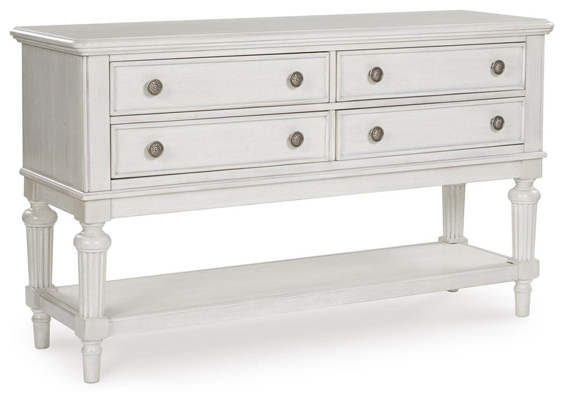 Ashley Furniture Montelaine dining server with closed doors, wood finish, and elegant design, showcasing ample storage space.