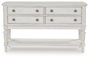 Montelaine Ashley Furniture dining server with a sleek wood finish, featuring multiple storage compartments and a modern design.