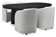 Ashley Furniture Rowanbeck dining room set with a wooden table and six upholstered chairs in a modern dining package.