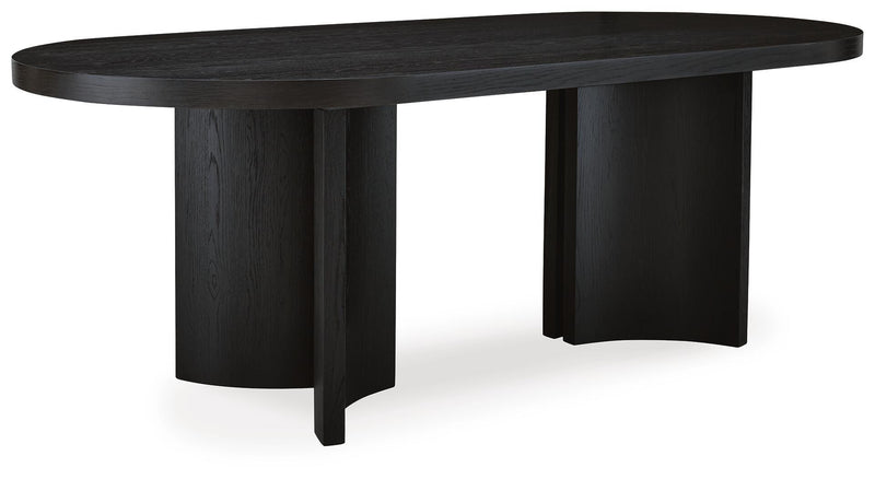 Ashley Furniture Rowanbeck dining room set with a table and six chairs, shown from an angled side view in a modern dining space.