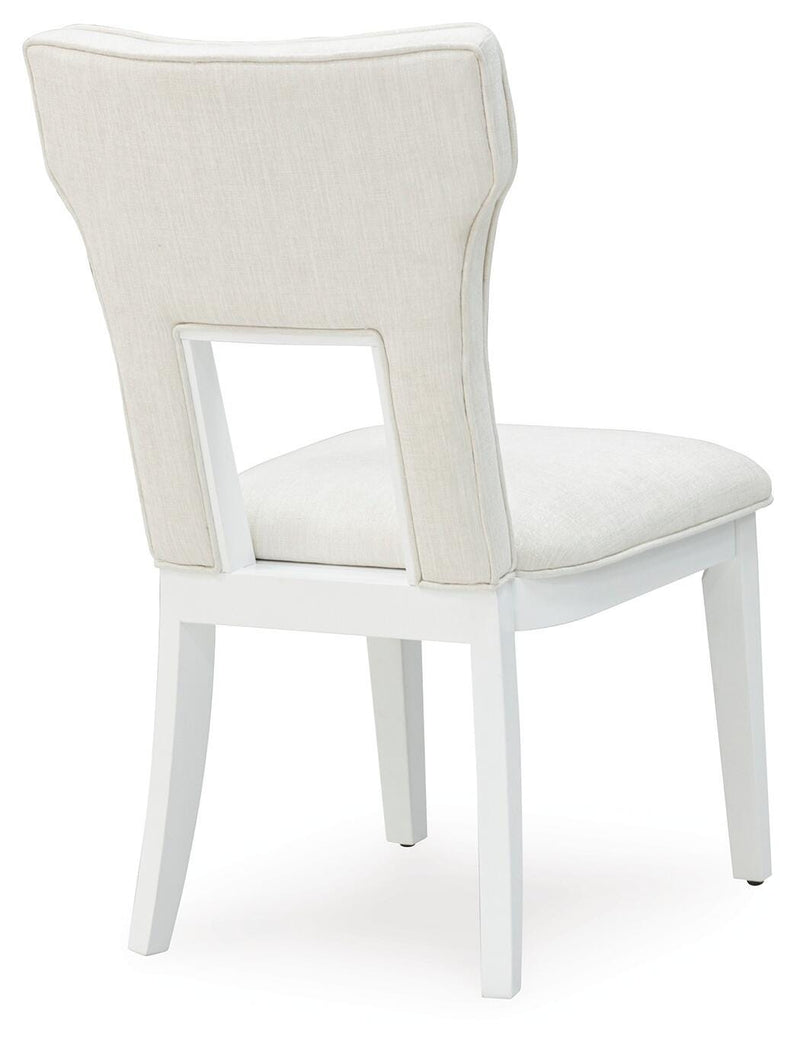 Ashley Furniture Chalanna dining chair with dark wood finish, padded seat and backrest, shown from the back.