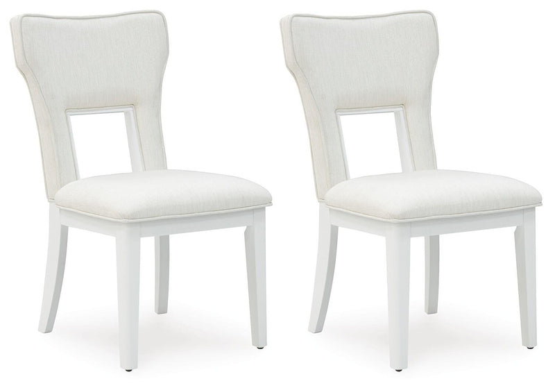 Ashley Furniture Chalanna dining chair with beige upholstered seat and dark wood legs, shown from an angled side view.