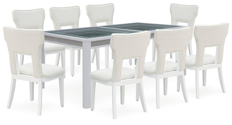 Ashley Furniture Chalanna dining room set with a table and matching chairs in a modern design, shown in a stylish dining room setting.