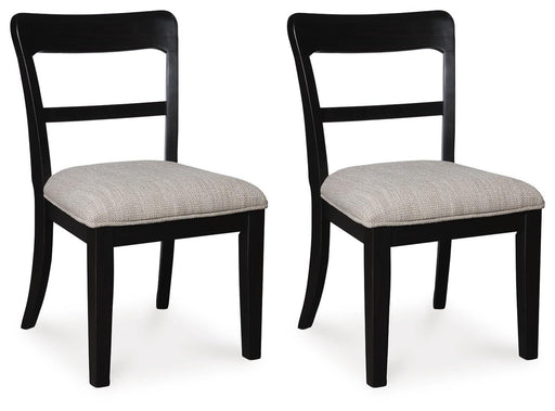 Ashley Furniture Greddinton dining chair with upholstered seat and wooden frame, shown from a side angle.