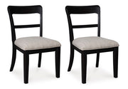 Ashley Furniture Greddinton dining room set with a wooden table and six upholstered chairs, shown from an angled side view.