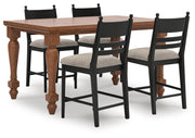 Ashley Furniture Greddinton dining room set with wooden table and six upholstered chairs, elegant hardwood finish.