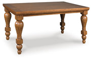 Ashley Furniture Greddinton dining room set with a table and six chairs, showcased from an angled side view.