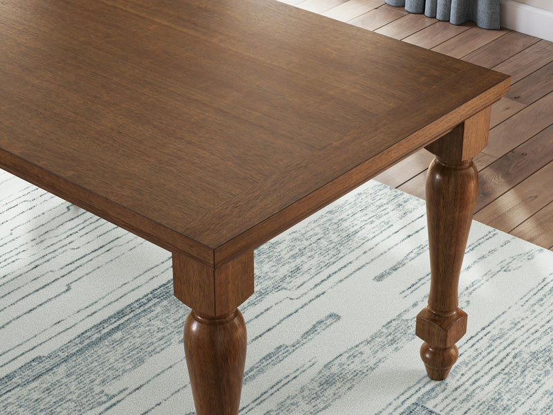Ashley Furniture Greddinton dining room set featuring a wooden table and matching chairs with elegant upholstery and detailed design.