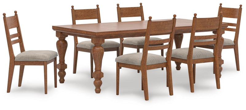 Ashley Furniture Greddinton dining room set with a wooden table and matching chairs, showcasing elegant design and sturdy construction.