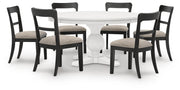 Ashley Furniture Greddinton dining room set with a wooden table and matching chairs in a modern dining space.
