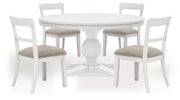Ashley Furniture Greddinton dining room set with a wooden table and matching chairs in a modern dining space.