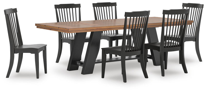 Ashley Furniture Greddinton dining room set featuring a table with six upholstered chairs in a warm wood finish.