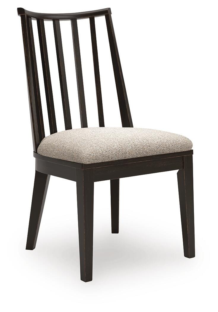 Ashley Furniture Galliden dining room set with a wooden table and matching chairs, shown from an angled side view.