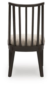 Ashley Furniture Galliden dining room set featuring a rectangular table and matching chairs in a modern wood finish.