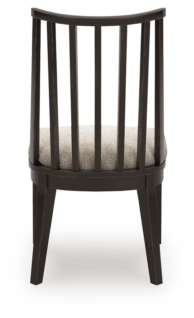 Ashley Furniture Galliden dining room set featuring a rectangular table and matching chairs in a modern wood finish.