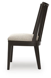 Ashley Furniture Galliden dining room set with a wooden table and matching chairs in a modern dining space.