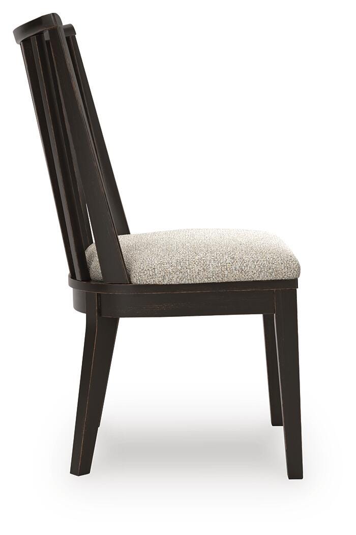 Ashley Furniture Galliden dining chair with wooden legs and upholstered seat, shown from a side view.