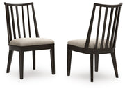 Ashley Furniture Galliden dining room set with a wooden table and six matching chairs, shown from an angled side view.