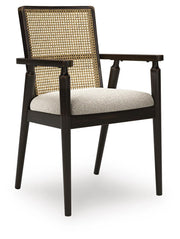 Ashley Furniture Galliden dining room set with a wooden table and six matching chairs, shown from an angle.
