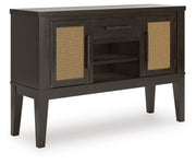 Ashley Furniture Galliden dining room set with a wooden table and matching chairs, shown from an angled side view.