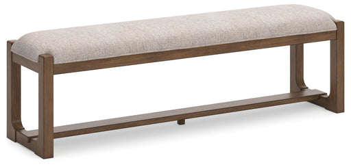 Ashley Furniture Cabalynn 63-inch wooden dining bench with angled view, showcasing its sturdy design and warm wood finish.