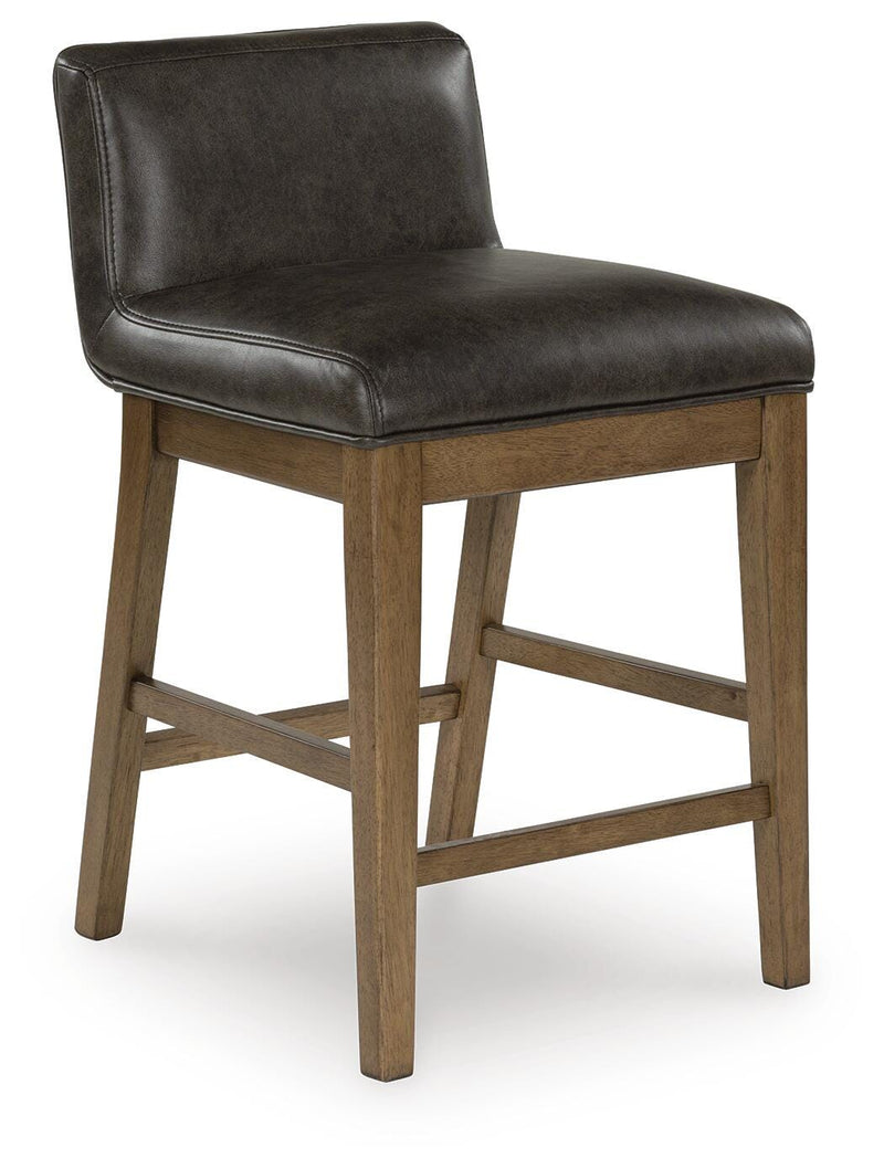 Ashley Furniture Cabalynn counter height barstool with wooden legs and upholstered seat, shown from an angled side view.