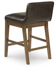 Ashley Furniture Cabalynn counter height barstool with a backrest, shown from a back angle with dark wood finish and upholstered seat.
