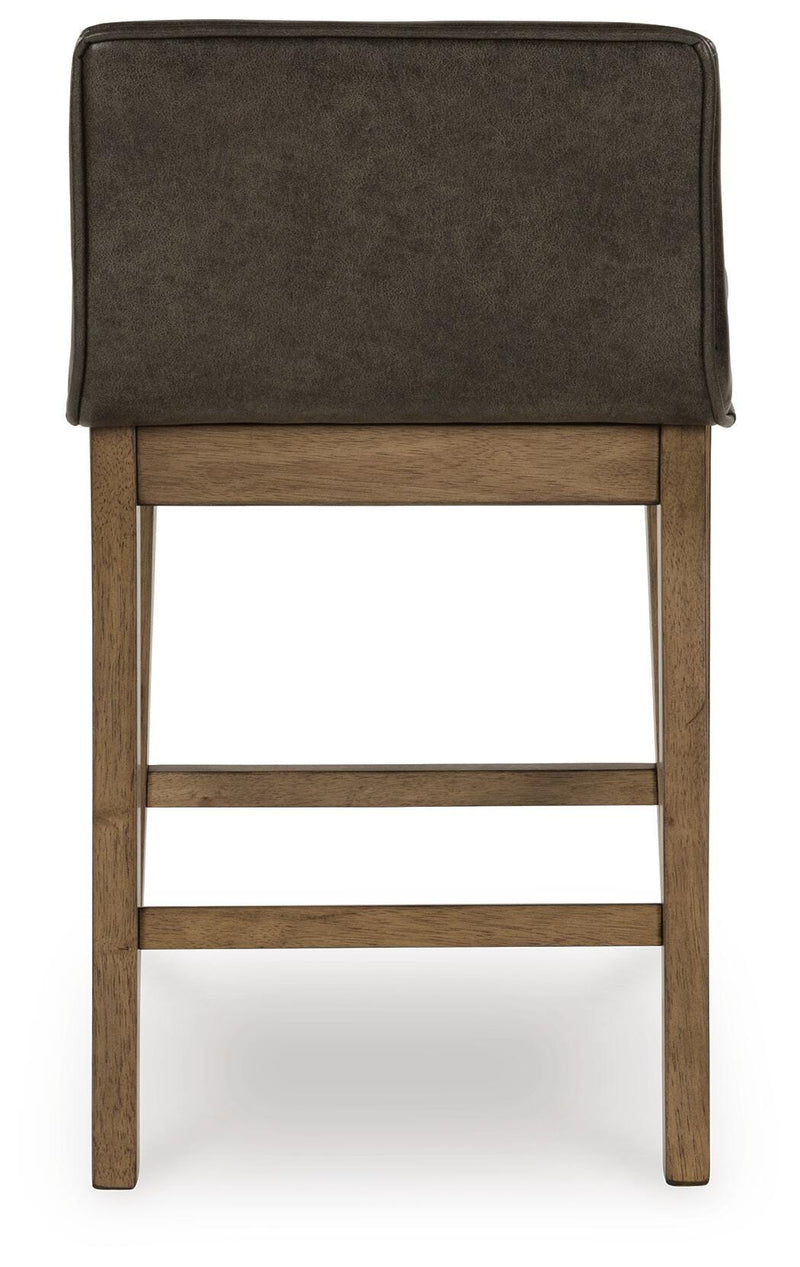 Ashley Furniture Cabalynn counter height barstool with a padded backrest and wooden legs, shown from the back.