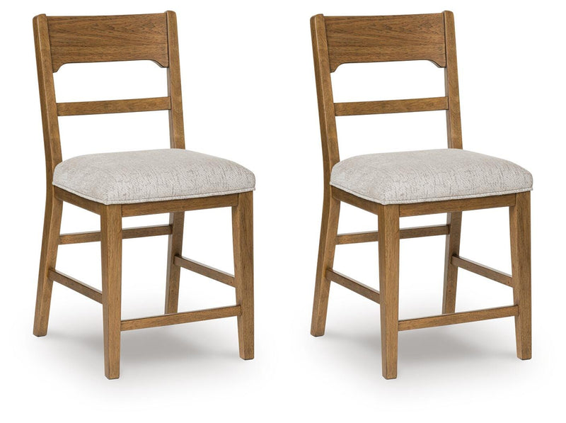 Ashley Furniture Cabalynn counter height barstool with wooden legs and upholstered seat, shown from a side angle.