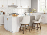 Ashley Furniture Cabalynn counter height barstool with a sleek wooden frame and upholstered seat, shown from the side.
