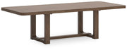Ashley Furniture Cabalynn dining extension table shown from an angled side view, featuring a wooden surface and sturdy legs.
