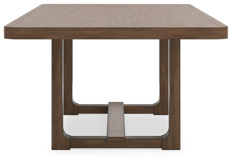 Ashley Furniture Cabalynn dining extension table with a wooden finish and sturdy legs, designed for versatile dining spaces.