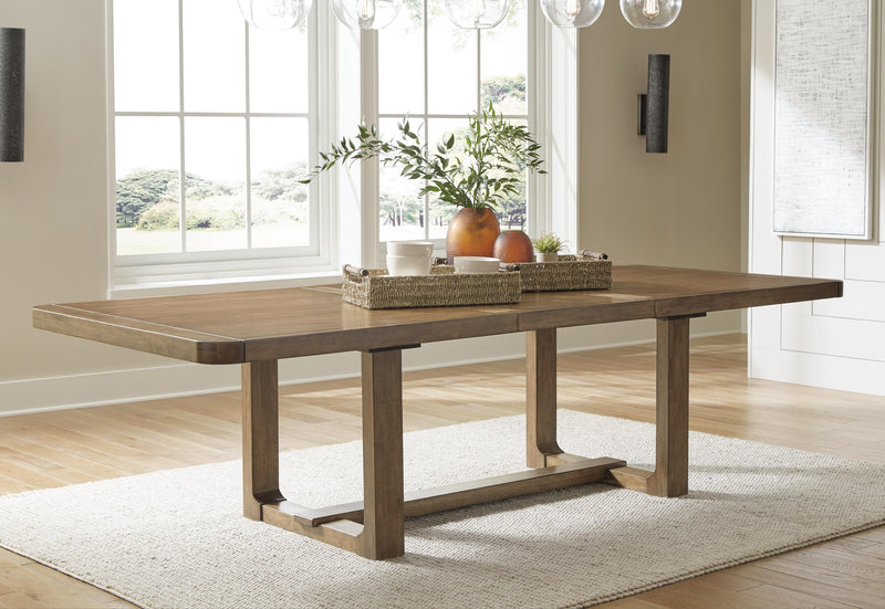 Ashley Furniture Cabalynn dining extension table with leaf, showcasing a polished wood surface and sturdy support legs.
