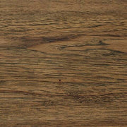 Ashley Furniture Cabalynn dining extension table with a dark wood finish, showcasing a spacious surface and sturdy design.