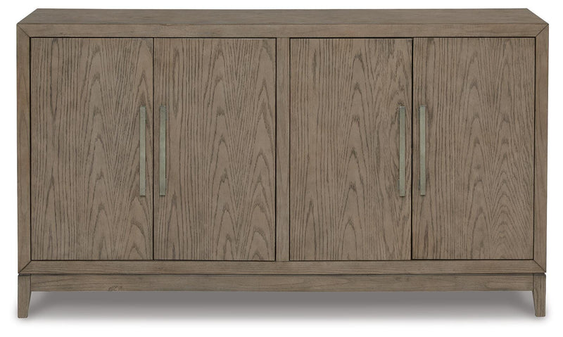 Ashley Furniture Chrestner dining server with wood finish, featuring multiple storage compartments and elegant design details.