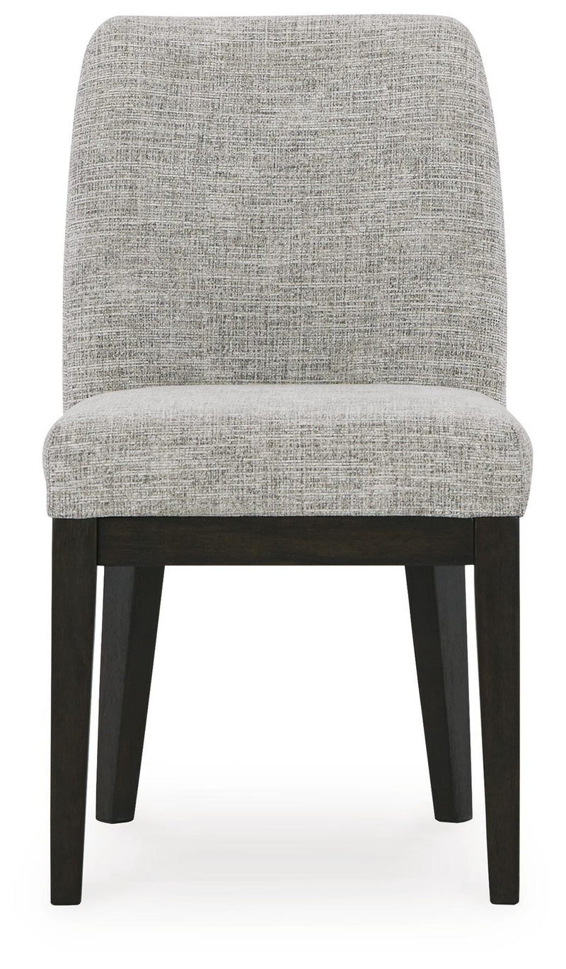 Ashley Furniture Burkhaus dining room set with a wooden table and matching chairs, shown from a front head-on view.