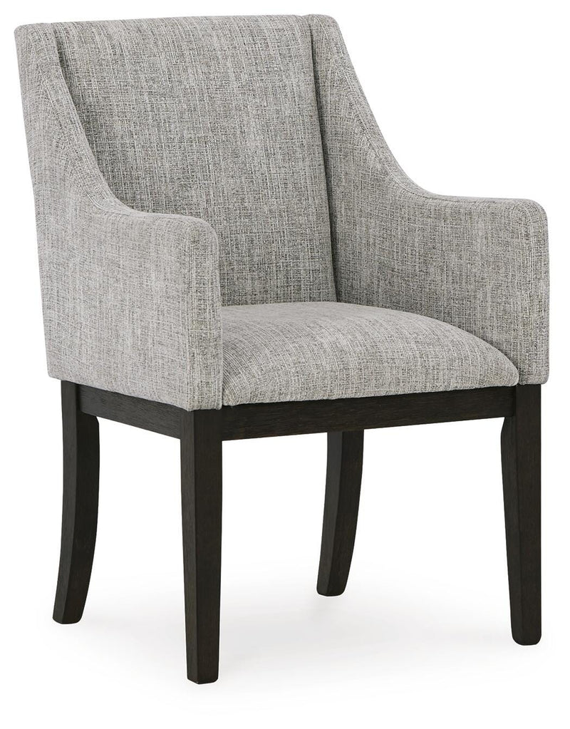 Ashley Furniture Burkhaus dining room set with a rectangular table and six upholstered chairs, shown from an angled side view.