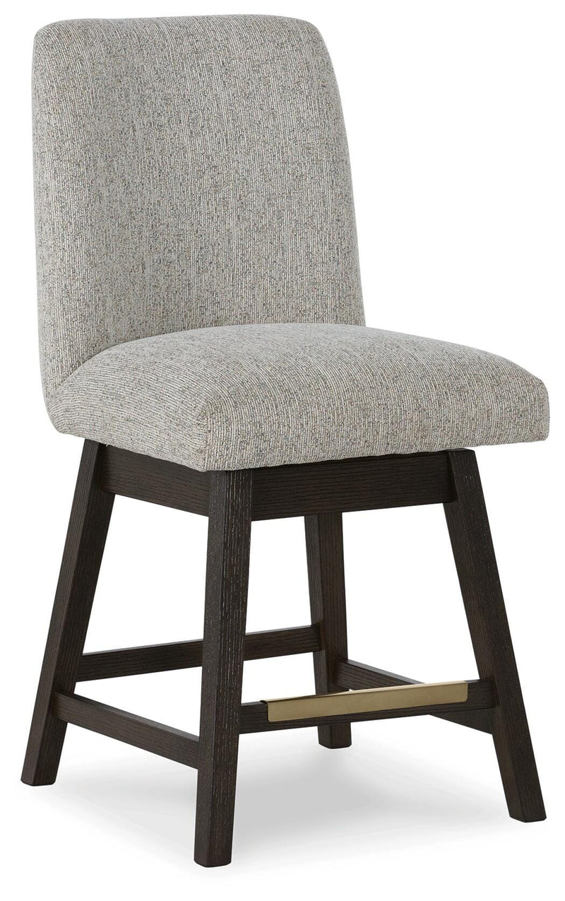 Ashley Furniture Burkhaus dining room set with a round table and six upholstered chairs, shown from an angled side view.