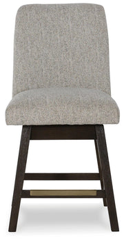 Ashley Furniture Burkhaus counter height barstool with a wood finish and padded seat, shown from the front in a modern dining setting.