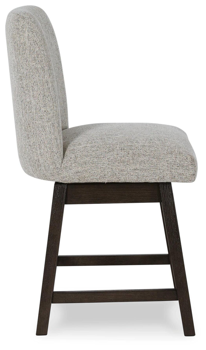 Ashley Furniture dining room set with a wooden table and matching chairs, ideal for a modern dining space.