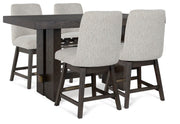 Ashley Furniture dining room set with a wooden table and matching chairs, shown in a stylish dining space.