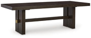 Ashley Furniture Burkhaus dining room set with a round table and six upholstered chairs, shown at an angle.
