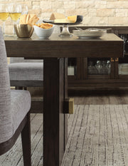 Ashley Furniture Burkhaus dining room set with a table and chairs, featuring a stylish wood finish and modern design.