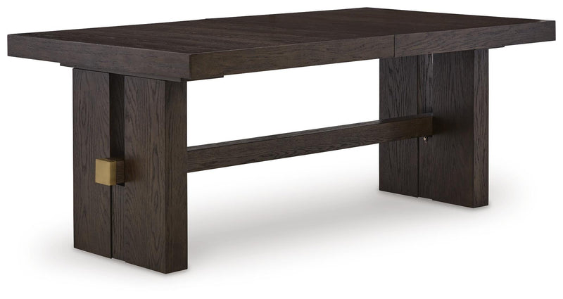 Ashley Furniture Burkhaus dining room set with a dining table and chairs, shown from an angled view in a modern dining space.