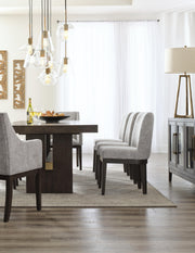Ashley Furniture Burkhaus dining room set featuring a table and chairs in a modern design.