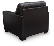 Ashley Furniture Glennbre Chair with plush fabric upholstery and modern design, shown in a stylish living room setting.