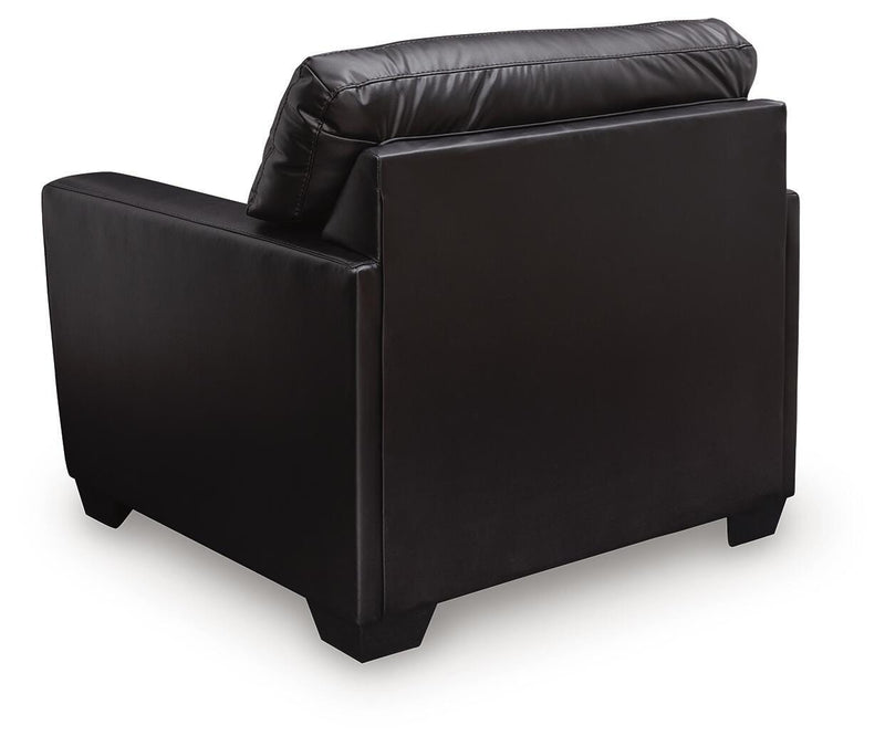 Ashley Furniture Glennbre Chair with plush fabric upholstery and modern design, shown in a stylish living room setting.