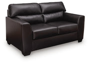 Ashley Furniture Glennbre loveseat with plush fabric and cushioning, shown in a cozy living room setting.