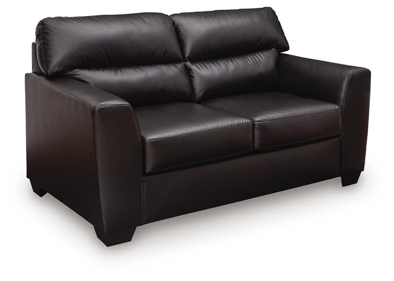 Ashley Furniture Glennbre loveseat with plush fabric and cushioning, shown in a cozy living room setting.