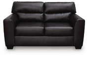 Ashley Furniture Glennbre loveseat with plush fabric and cushioned armrests, perfect for cozy living room seating.